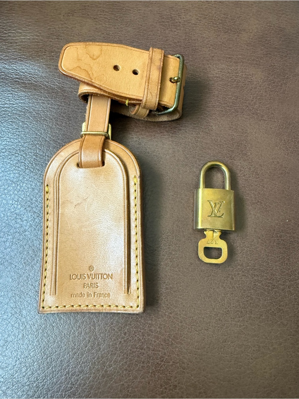 Louis Vuitton luggage tag with lock and key